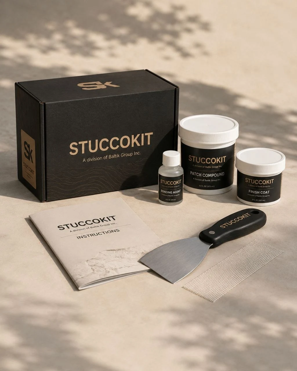 StuccoKit package with finish containers and application tool