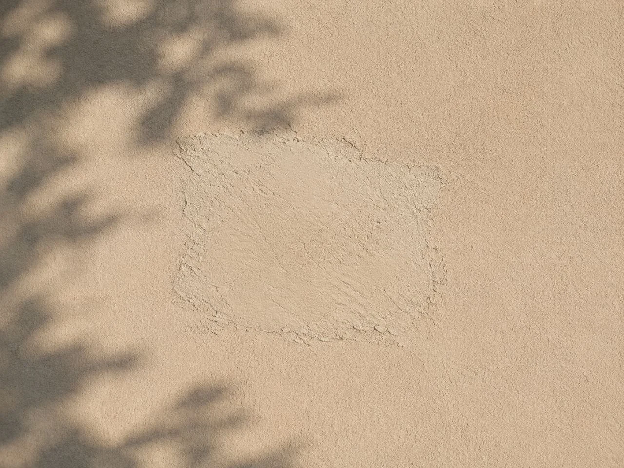 Visible surface touch-up area on stucco